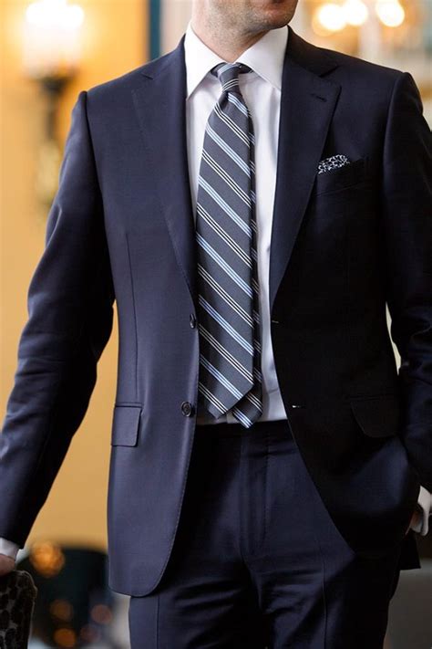 navy blue suit with tie.